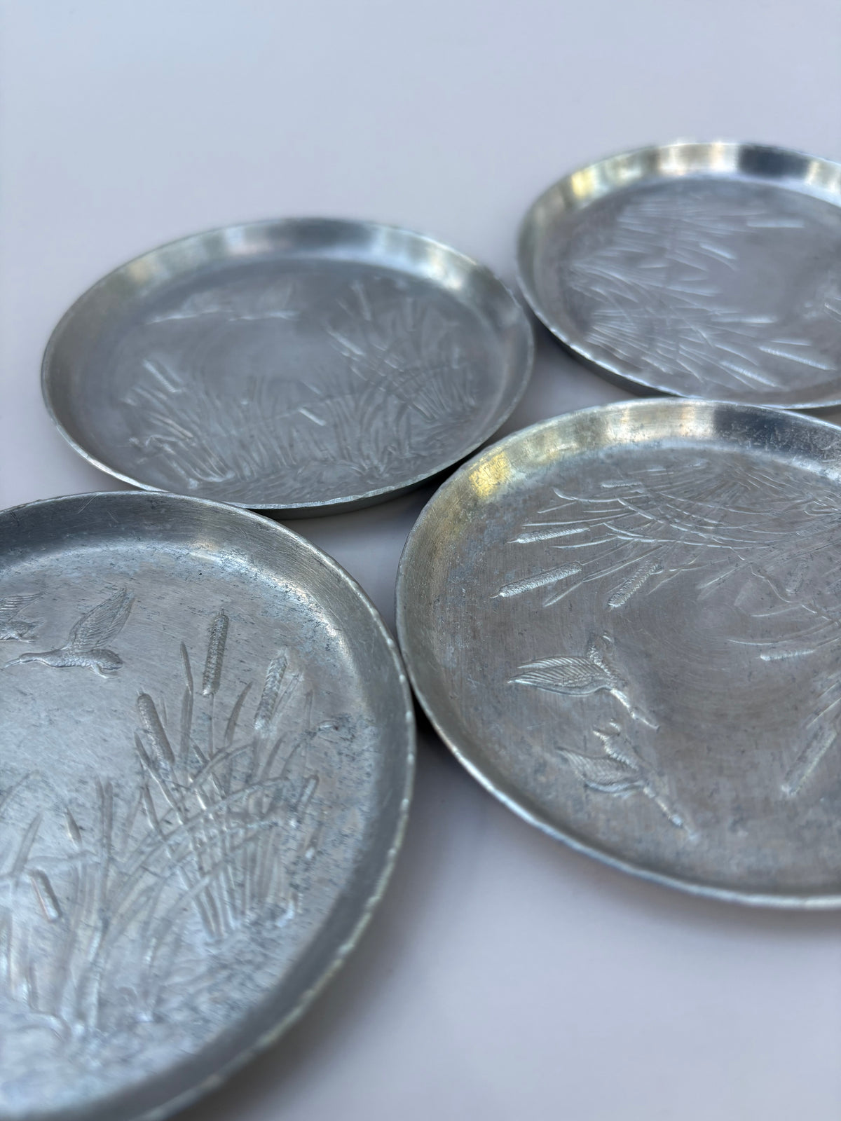 Vintage Set of Aluminum Coasters
