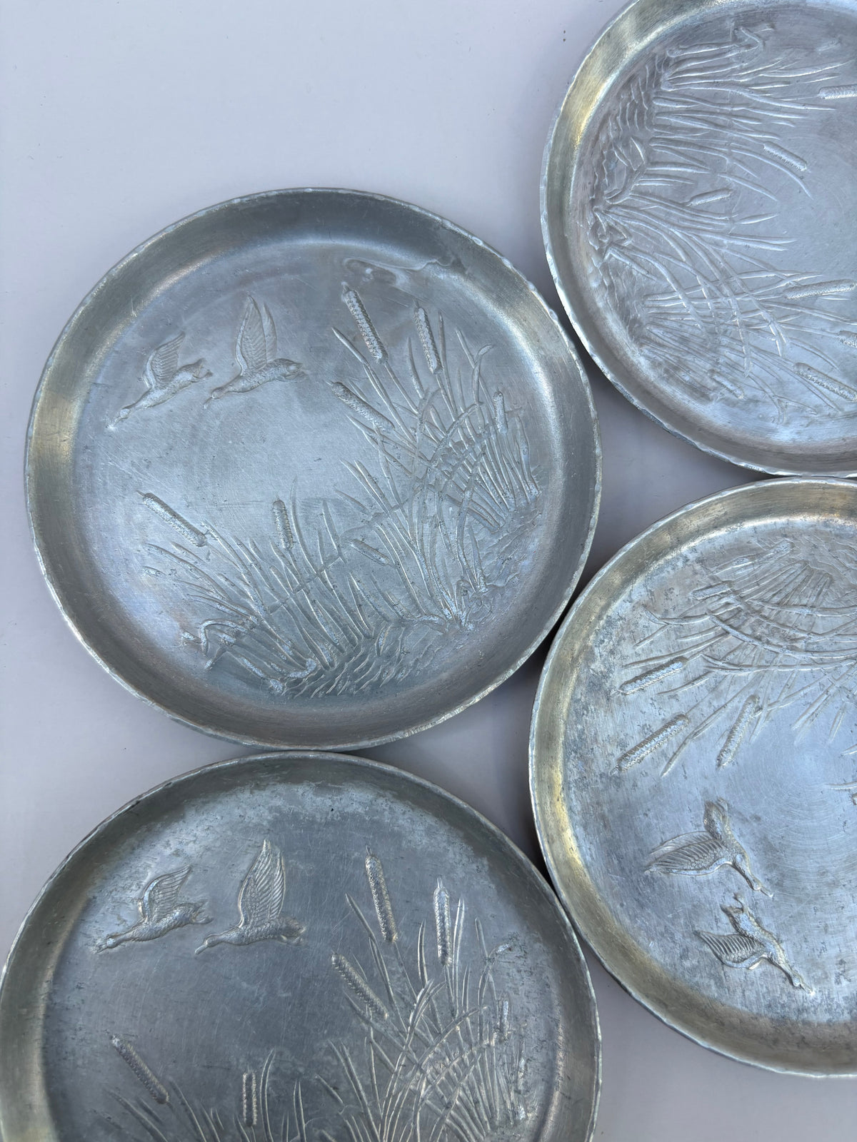 Vintage Set of Aluminum Coasters